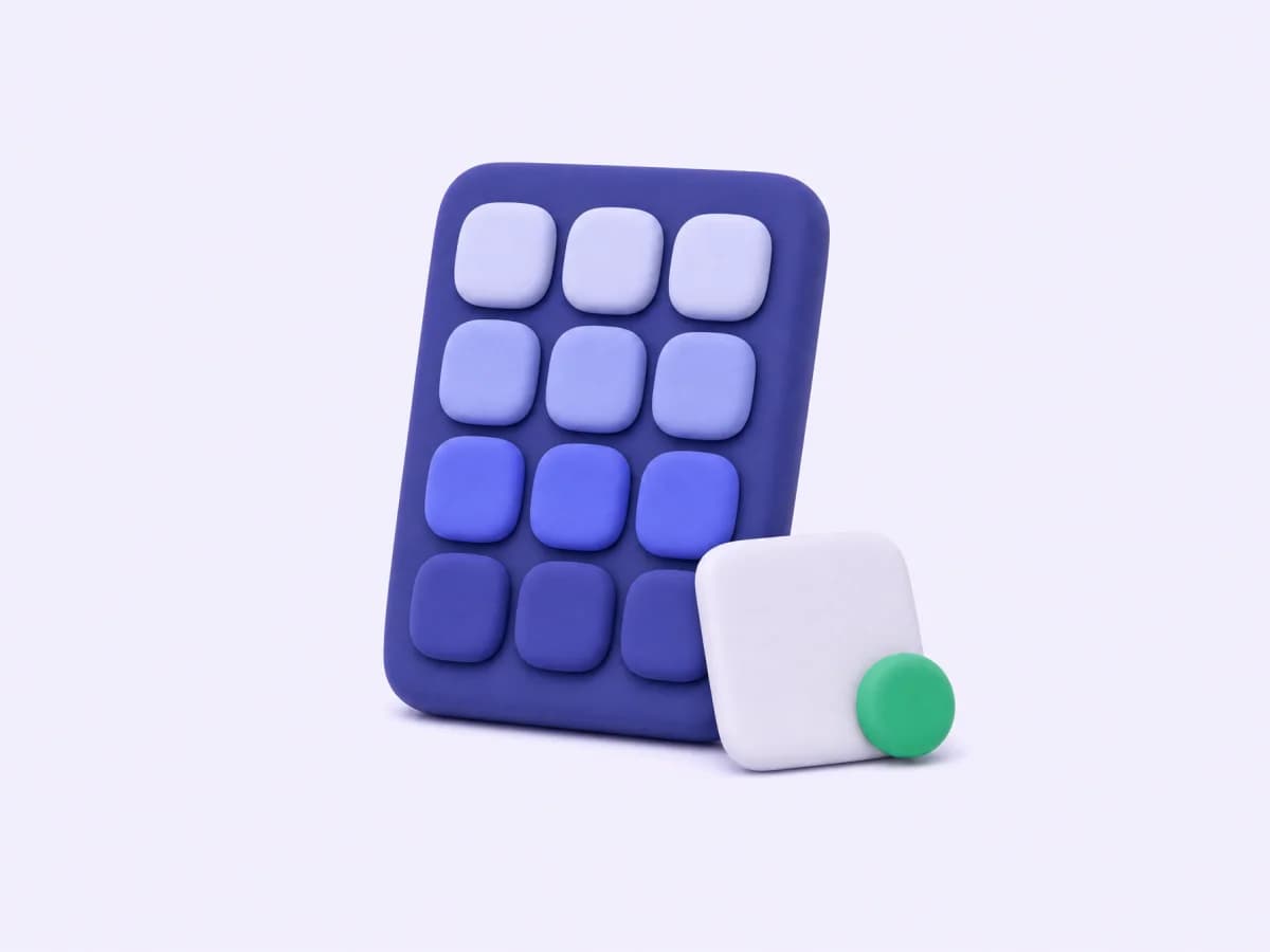 A clay phone keypad next to a small tag with a green dot