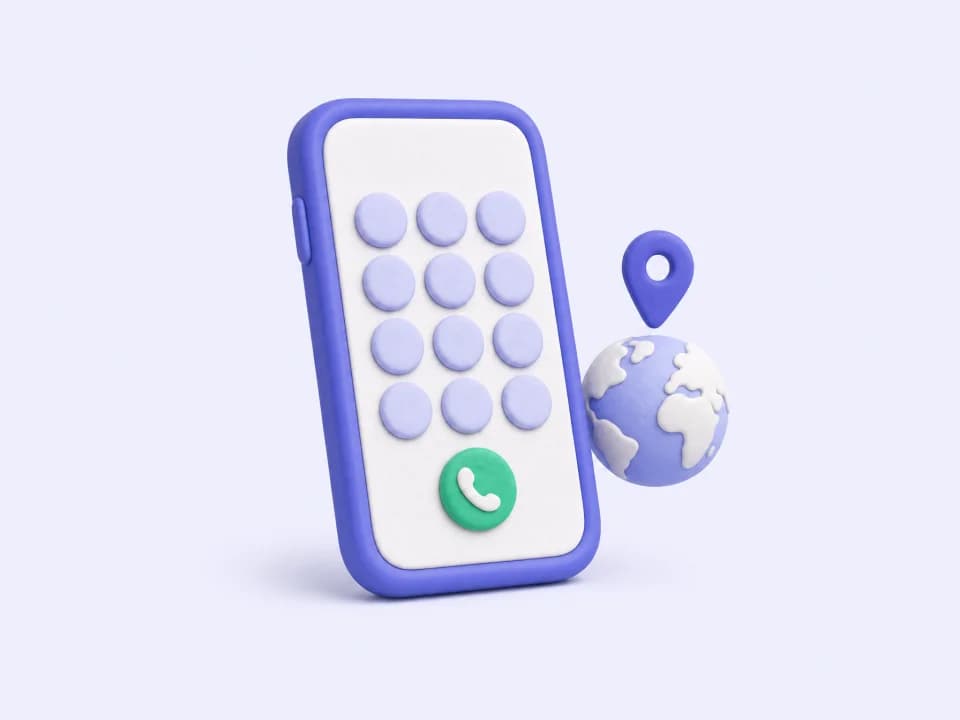 A phone showing a keypad and a green call button, next to a globe